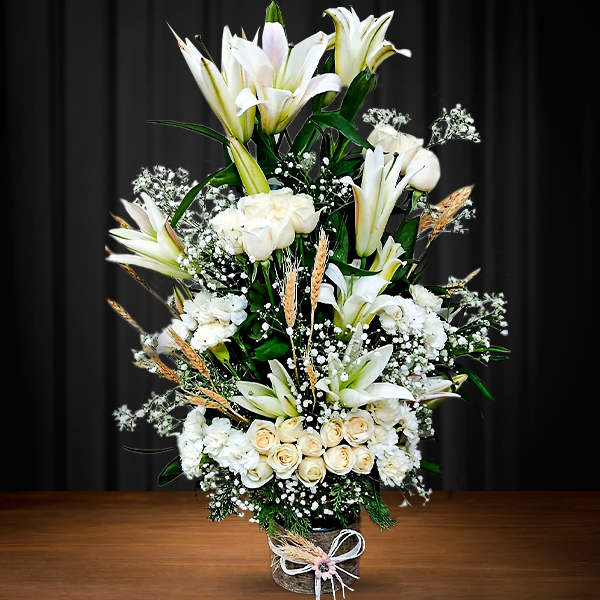 Elegant White Floral Arrangement with Lilies, Roses & Carnation